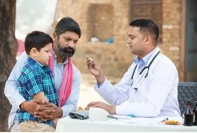 Prototype `indian-doctor-examine.jpg`.